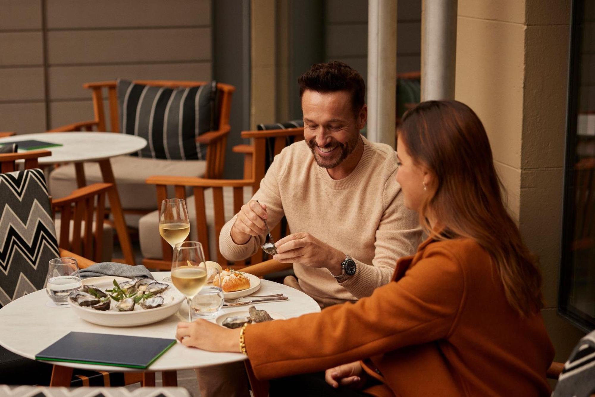 The Tasman, A Luxury Collection Hotel, Hobart Bagian luar foto A couple dining at the restaurant